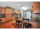 Spacious kitchen with hardwood floors, granite countertops, stainless steel appliances, and an island at 4111 Alayna Lee Cir, Mcdonough, GA 30252