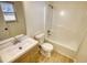 Bathroom features a modern vanity and a tub-shower combination at 61 Andrew Rd, Covington, GA 30016