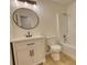 Bathroom featuring a vanity with a white countertop and dark fixtures and a shower at 61 Andrew Rd, Covington, GA 30016