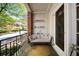 Comfortable balcony with a cozy daybed, creating a relaxing outdoor retreat at 794 Frederica Ne St # 2, Atlanta, GA 30306