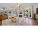 Bright and airy living room with hardwood floors, modern furnishings, and access to the balcony at 794 Frederica Ne St # 2, Atlanta, GA 30306