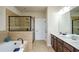 Modern bathroom with a walk-in shower, soaking tub, and double sink vanity at 1323 Faircrest Way, Suwanee, GA 30024