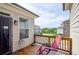 Cozy deck with a lounge chair and neighborhood views at 1323 Faircrest Way, Suwanee, GA 30024