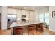 Bright, updated kitchen with granite counters, stainless steel appliances, and hardwood floors at 1323 Faircrest Way, Suwanee, GA 30024