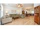 Open living area with hardwood floors and comfortable furnishings at 1323 Faircrest Way, Suwanee, GA 30024
