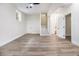 Finished basement area featuring modern flooring, access to stairs, and potential for various uses at 3185 Hammarskjold Dr, East Point, GA 30344