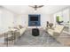 Bright living room with a blue accent wall and a modern fireplace at 3185 Hammarskjold Dr, East Point, GA 30344