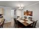 Inviting dining area with a stylish table set, complementing the adjacent kitchen and creating a welcoming atmosphere at 3795 Soapstone Rd, Decatur, GA 30034