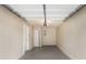 Clean, empty garage with a door to the house for easy access at 3795 Soapstone Rd, Decatur, GA 30034