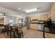 Stylish kitchen featuring a center island, modern appliances, granite countertops, and convenient seating for casual dining at 3795 Soapstone Rd, Decatur, GA 30034
