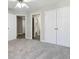 Bedroom with neutral carpet, ceiling fan, and ample natural light at 4114 Bigsage Dr, College Park, GA 30349