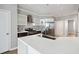 Modern kitchen featuring quartz countertops, stainless steel appliances, and ample cabinet space for storage at 4114 Bigsage Dr, College Park, GA 30349