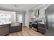 Stylish kitchen with stainless steel appliances, a farmhouse sink, and gray cabinetry, perfect for cooking at 4114 Bigsage Dr, College Park, GA 30349