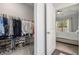 Walk-in closet adjacent to bedroom with visible shelving and convenient access at 515 Vandenburg Dr, Villa Rica, GA 30180