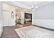 Open-concept dining room showcases modern chandelier, gray walls, and easy access to the kitchen and living area at 515 Vandenburg Dr, Villa Rica, GA 30180