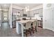 Modern kitchen featuring granite countertops, stainless steel appliances and shaker cabinets at 515 Vandenburg Dr, Villa Rica, GA 30180