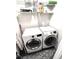 Efficient laundry area with modern LG and Samsung washer and dryer for in-home convenience at 703 Gettysburg Pl, Atlanta, GA 30350