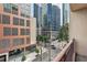 Balcony view showcasing urban skyline and neighborhood street at 1101 Juniper Ne St # 415, Atlanta, GA 30309