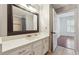 Clean, well-lit bathroom featuring white cabinets and quartz countertops at 1101 Juniper Ne St # 415, Atlanta, GA 30309