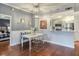 Cozy dining room featuring modern pendant lighting and an adjacent kitchen, creating an inviting space for meals at 1101 Juniper Ne St # 415, Atlanta, GA 30309