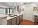 Modern kitchen with stainless steel appliances, white countertops, and gray cabinets at 1101 Juniper Ne St # 415, Atlanta, GA 30309