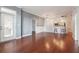 Spacious living room with hardwood floors, ample natural light, and access to a balcony at 1101 Juniper Ne St # 415, Atlanta, GA 30309