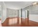 Spacious living room boasting hardwood floors and crown molding, offering a sophisticated yet comfortable living space at 1101 Juniper Ne St # 415, Atlanta, GA 30309