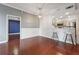 Open living room with hardwood floors and a view of the modern kitchen at 1101 Juniper Ne St # 415, Atlanta, GA 30309