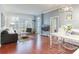 Bright living room with modern furnishings and a dining area at 1101 Juniper Ne St # 415, Atlanta, GA 30309