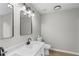 Bathroom features double sink with granite countertops and modern fixtures at 175 Cypress Dr, Covington, GA 30016