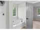 Bathroom with soaking tub and a separate shower at 175 Cypress Dr, Covington, GA 30016