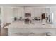 Bright kitchen featuring an island with granite countertops, stainless steel appliances, hardwood floors, and recessed lighting at 2042 Clay Rd, Snellville, GA 30078