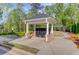 Community mail kiosk in a well-maintained green space, enhanced with a meandering walkway and landscaping at 2042 Clay Rd, Snellville, GA 30078