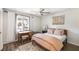 Comfortable bedroom with ceiling fan and desk area at 3228 Clairmont North Ne # 3228-A, Brookhaven, GA 30329