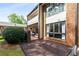 Brick-paved patio with outdoor seating area, perfect for relaxing and entertaining at 3228 Clairmont North Ne # 3228-A, Brookhaven, GA 30329