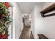 Inviting hallway with hardwood floors and convenient coat rack at 3228 Clairmont North Ne # 3228-A, Brookhaven, GA 30329