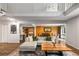 Open concept living room and dining room with staircase and wood floors at 3228 Clairmont North Ne # 3228-A, Brookhaven, GA 30329