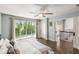 Bright and airy main bedroom with large window and ceiling fan at 3228 Clairmont North Ne # 3228-A, Brookhaven, GA 30329