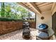 Outdoor patio with brick flooring, comfortable seating, a grill, and a fire pit at 3228 Clairmont North Ne # 3228-A, Brookhaven, GA 30329