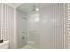 Shower featuring black and white patterned tile and clear glass door at 3228 Clairmont North Ne # 3228-A, Brookhaven, GA 30329