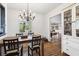 Dining area features a wooden table and chairs with bright windows at 1015 S Candler St, Decatur, GA 30030