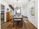 Classic dining room with hardwood floors and views to kitchen and staircase at 1015 S Candler St, Decatur, GA 30030