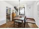 Classic dining room with hardwood floors and views to kitchen and staircase at 1015 S Candler St, Decatur, GA 30030