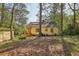 Charming cottage-style home with a well-maintained yard and inviting porch at 1015 S Candler St, Decatur, GA 30030
