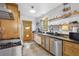 Cozy kitchen featuring open shelving, stainless steel appliances and modern fixtures at 1015 S Candler St, Decatur, GA 30030