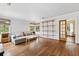 Inviting living room with hardwood floors, neutral tones, and ample natural light at 1015 S Candler St, Decatur, GA 30030