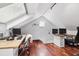Bright office with hardwood floors, a skylight, and dual workspaces at 1015 S Candler St, Decatur, GA 30030