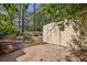 Backyard with storage shed, garden bed and stone pavers at 1015 S Candler St, Decatur, GA 30030