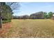Expansive backyard with play area and ample space for outdoor activities and gatherings at 2881 Terra View Sw Dr, Lilburn, GA 30047