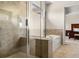 Bright bathroom showcasing a walk-in shower, soaking tub, and neutral tile at 2881 Terra View Sw Dr, Lilburn, GA 30047